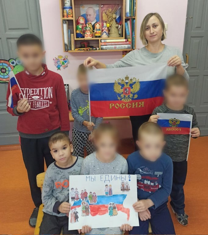 Семья псковского десантника, который убивал в Буче, похитила украинского мальчика — фото