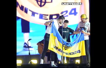 Во время концерта Imagine Dragons на сцену с музыкантами вышел герой клипа Crushed - Саша