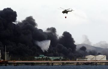 На Кубі загасили найбільшу в історії країни пожежу на нафтобазі На Кубі загасили найбільшу в історії країни пожежу на нафтобазі